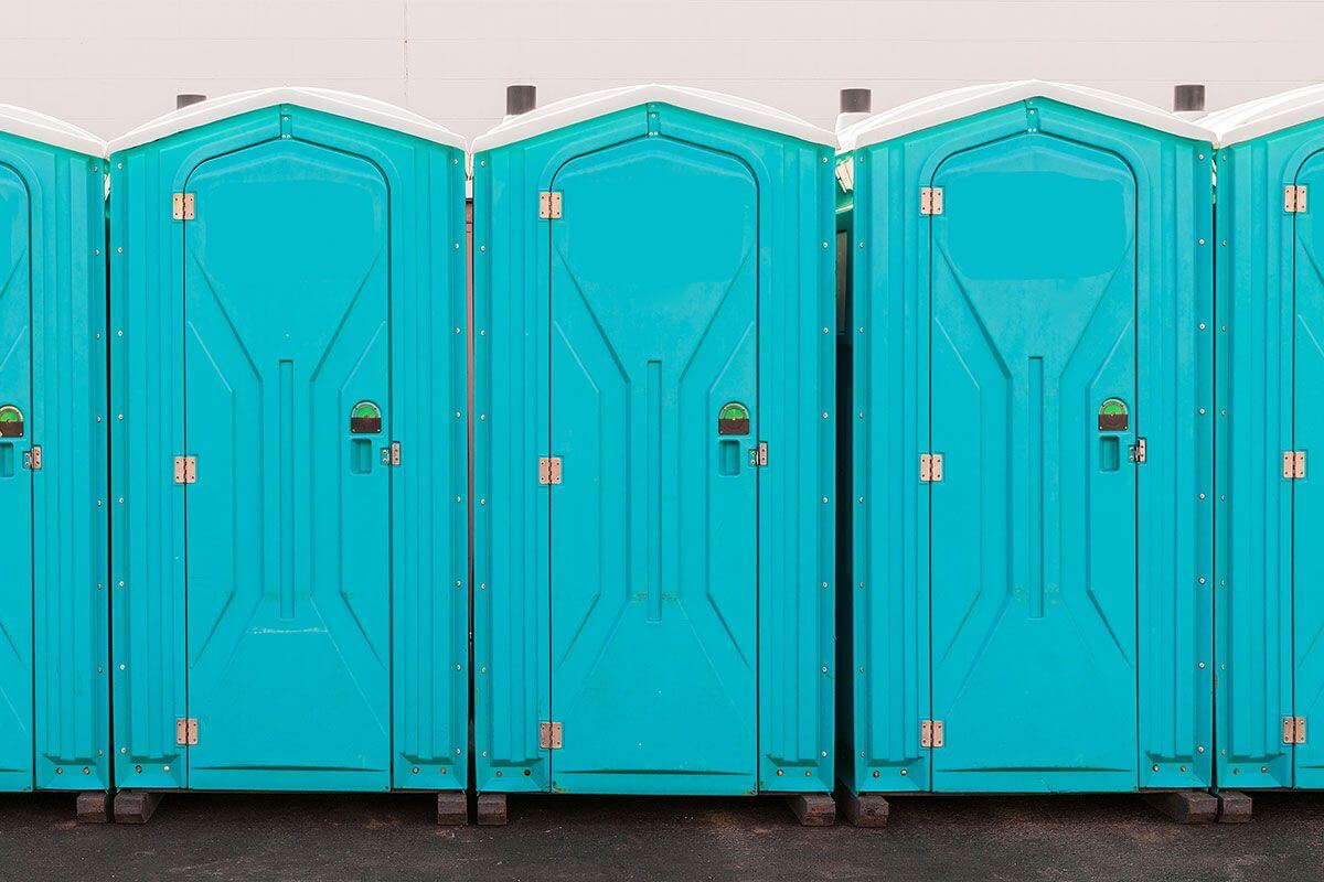 Industrial portable restroom units at a plant in Maricopa, Arizona
